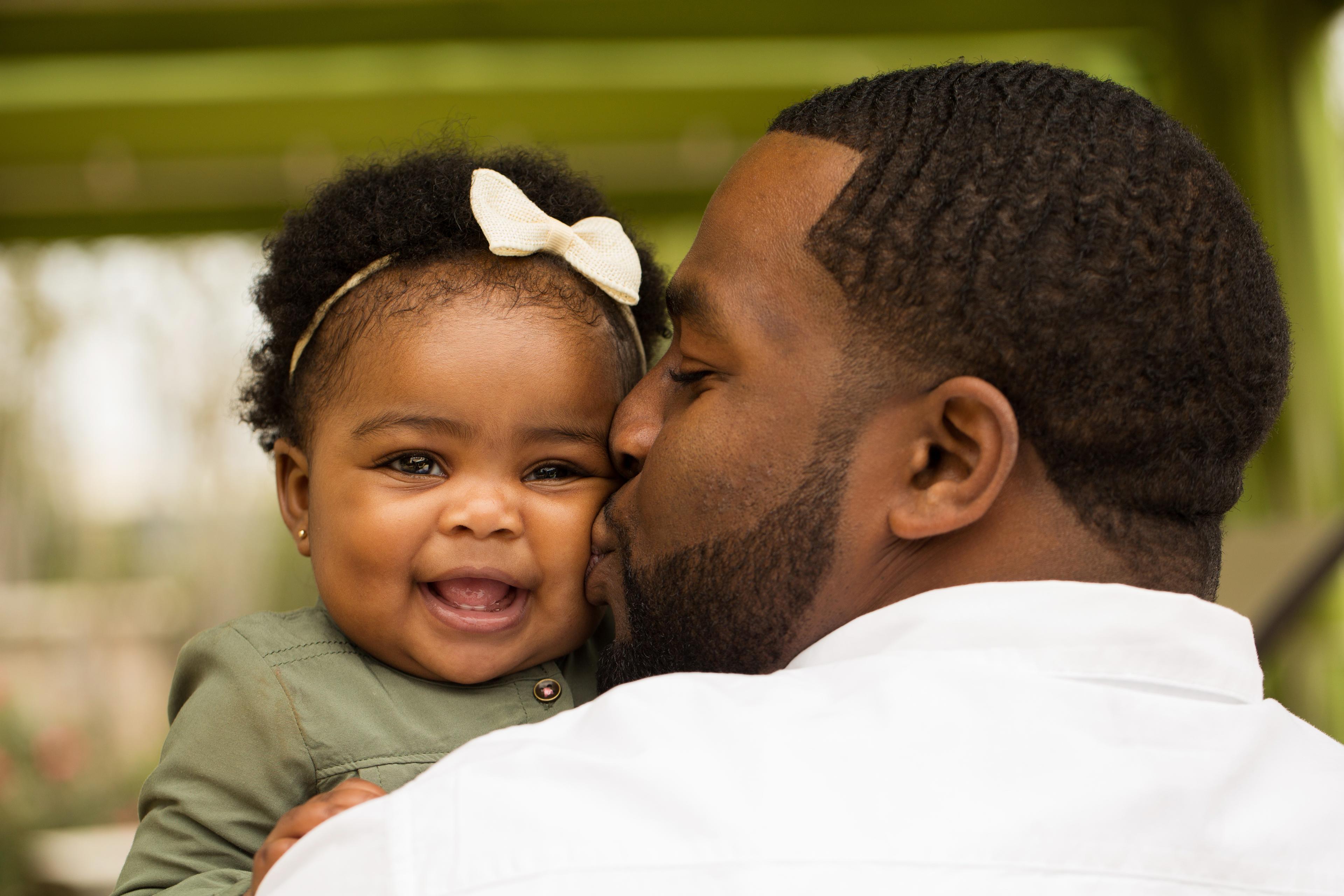 man holding girl