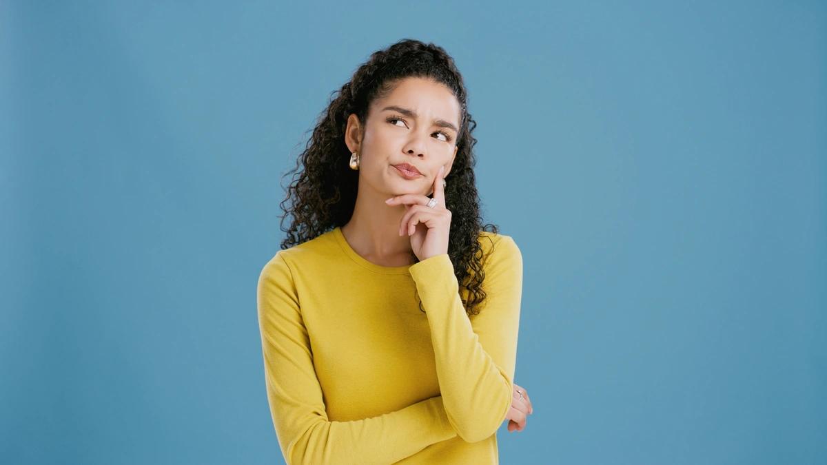woman thinking about tax filing date