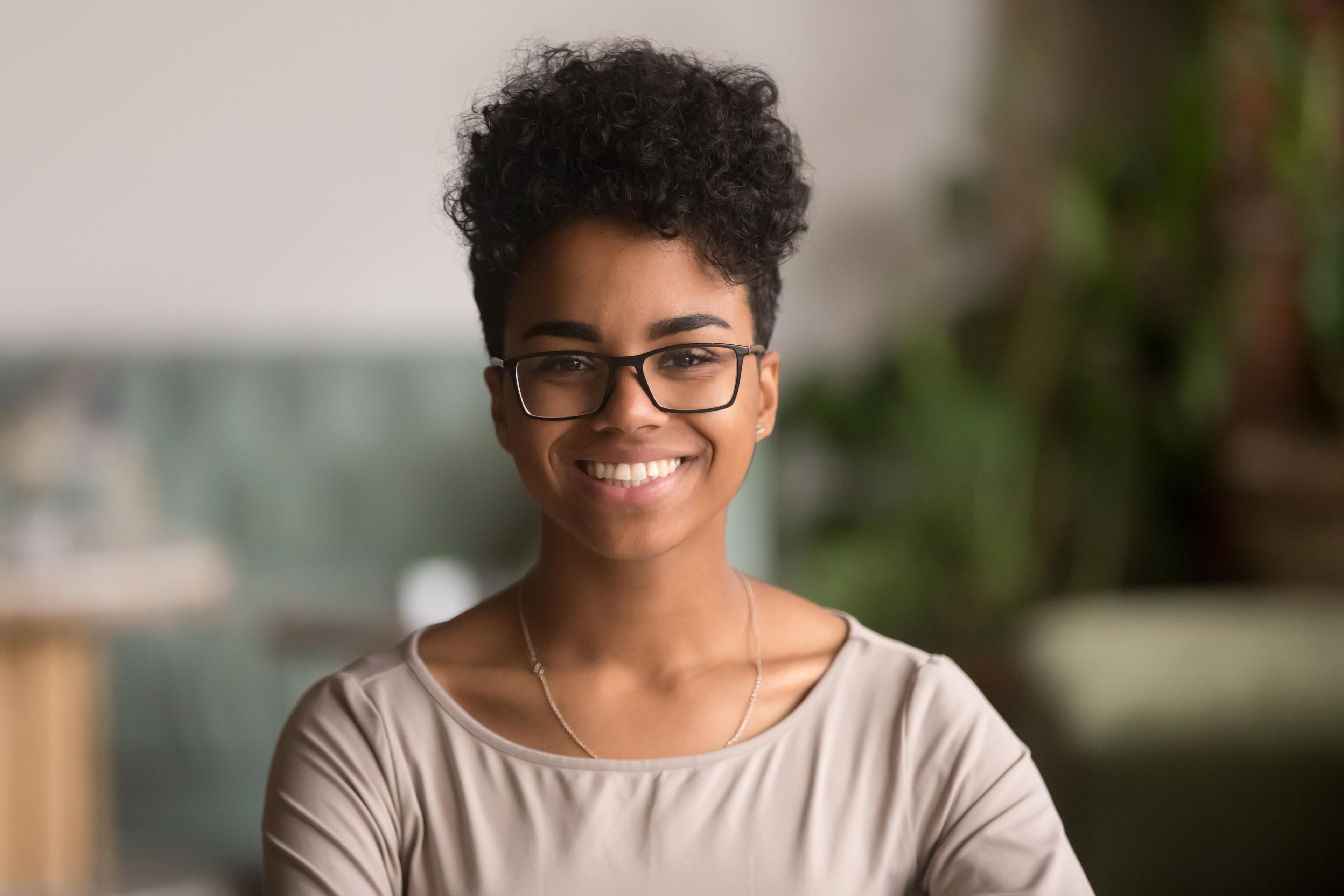 smiling woman wearing glasses