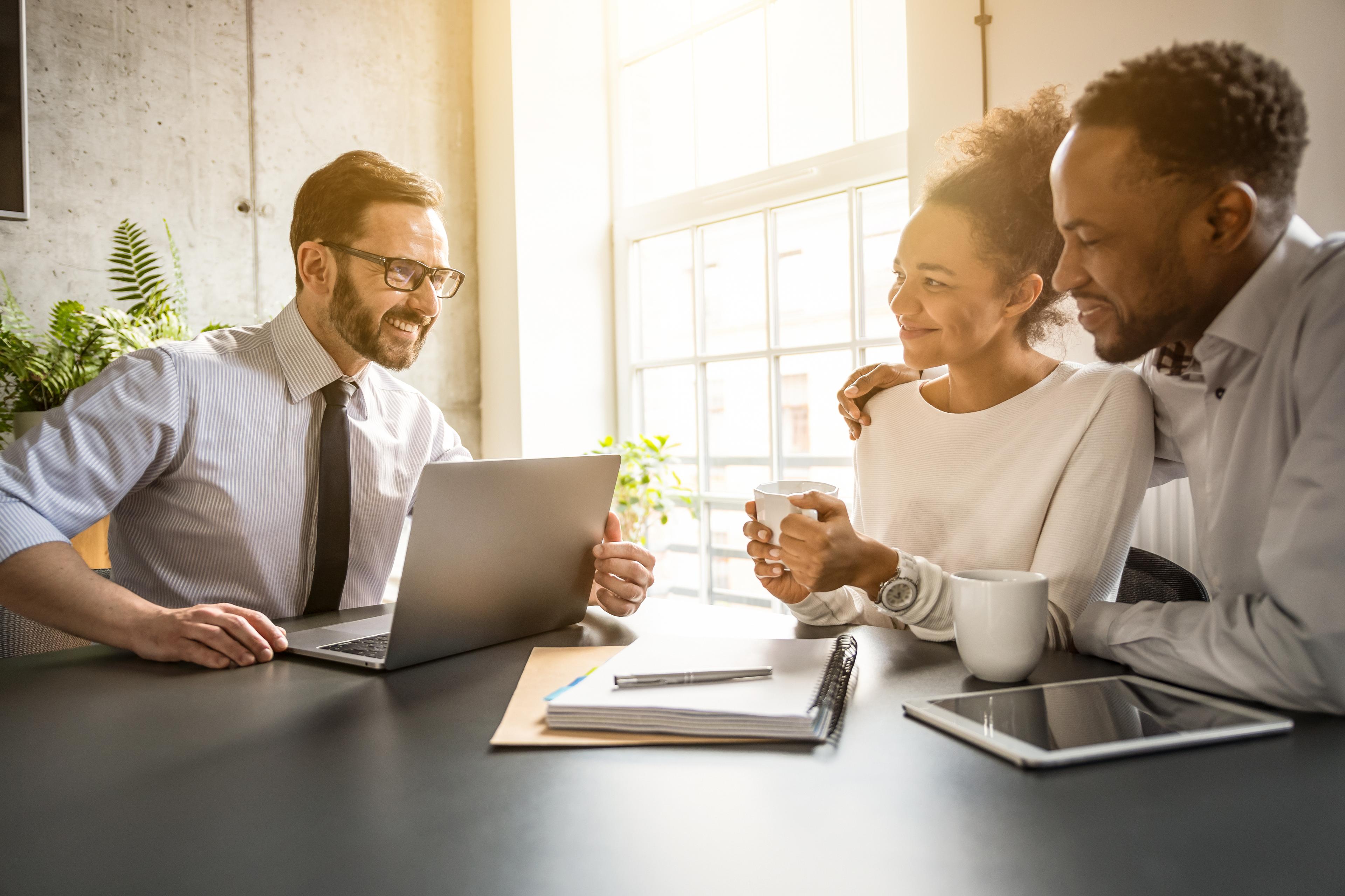 couple working with a tax professional