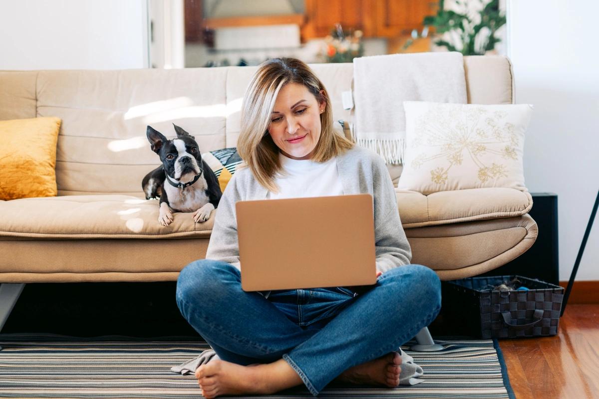 woman freelancer at home with dog