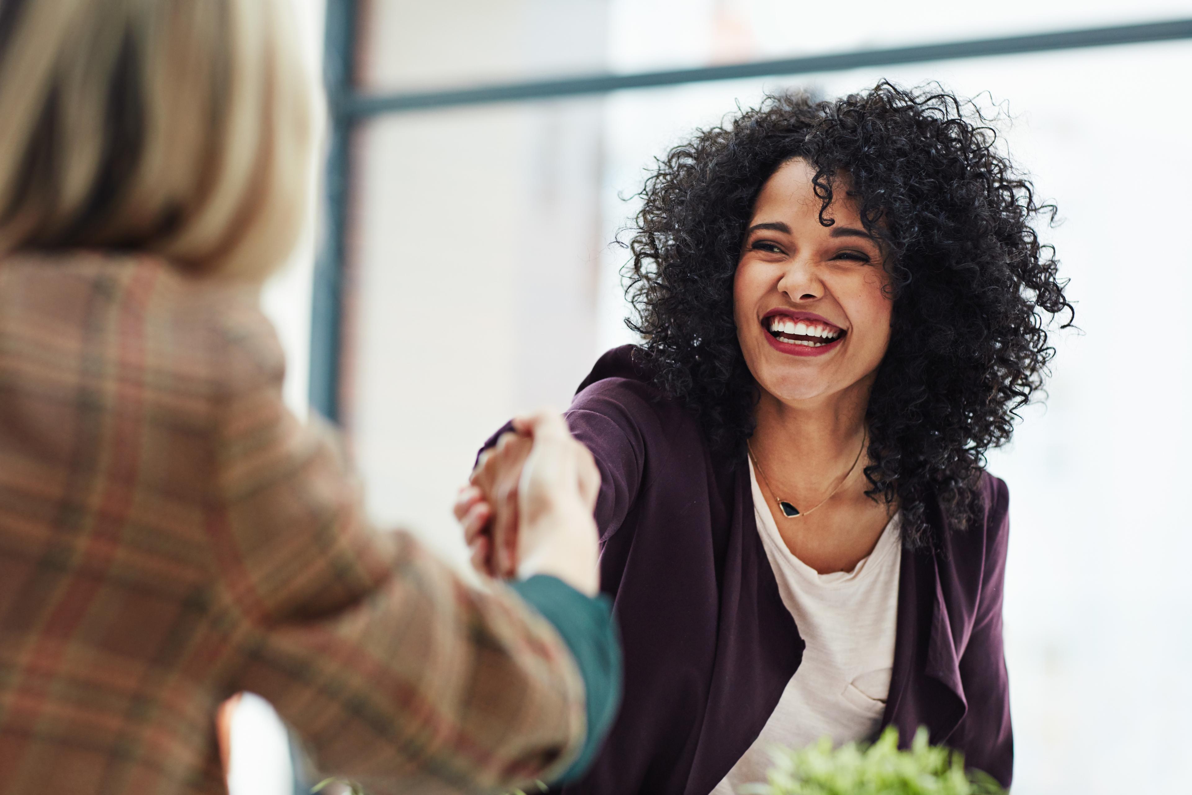 office handshake woman