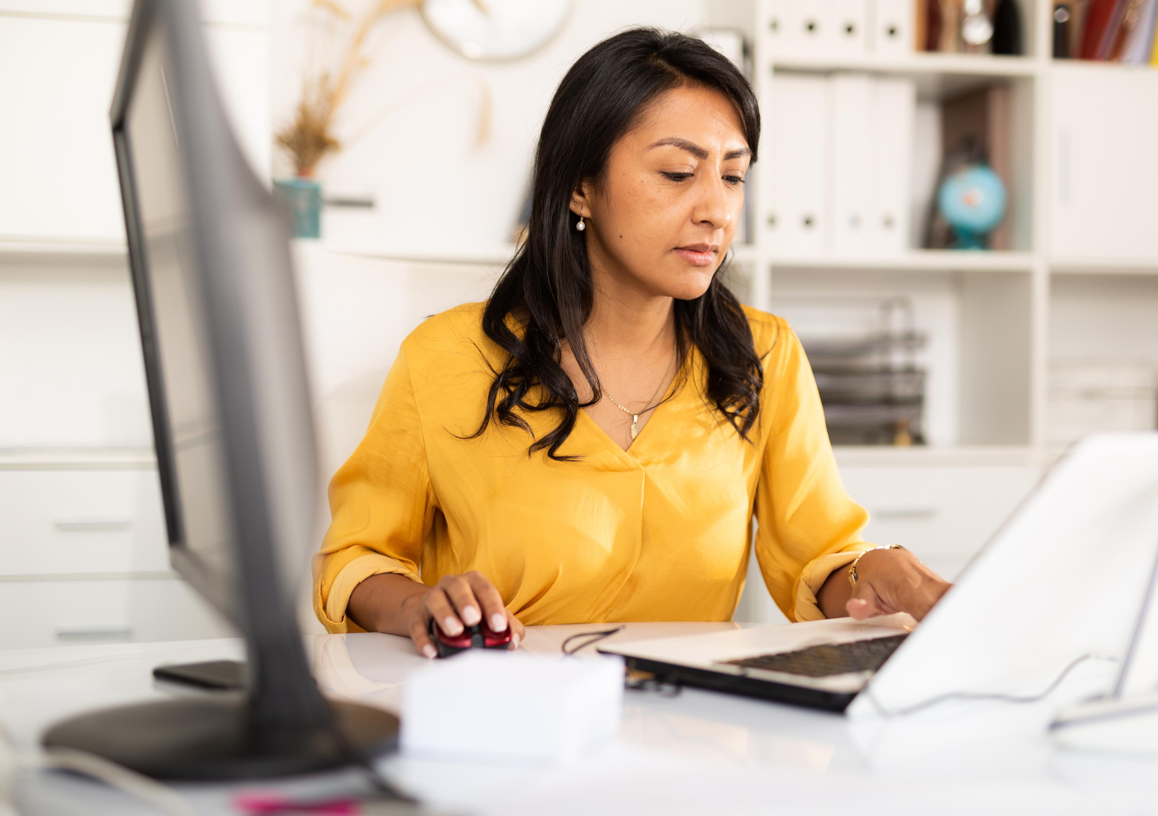 woman working at laptop