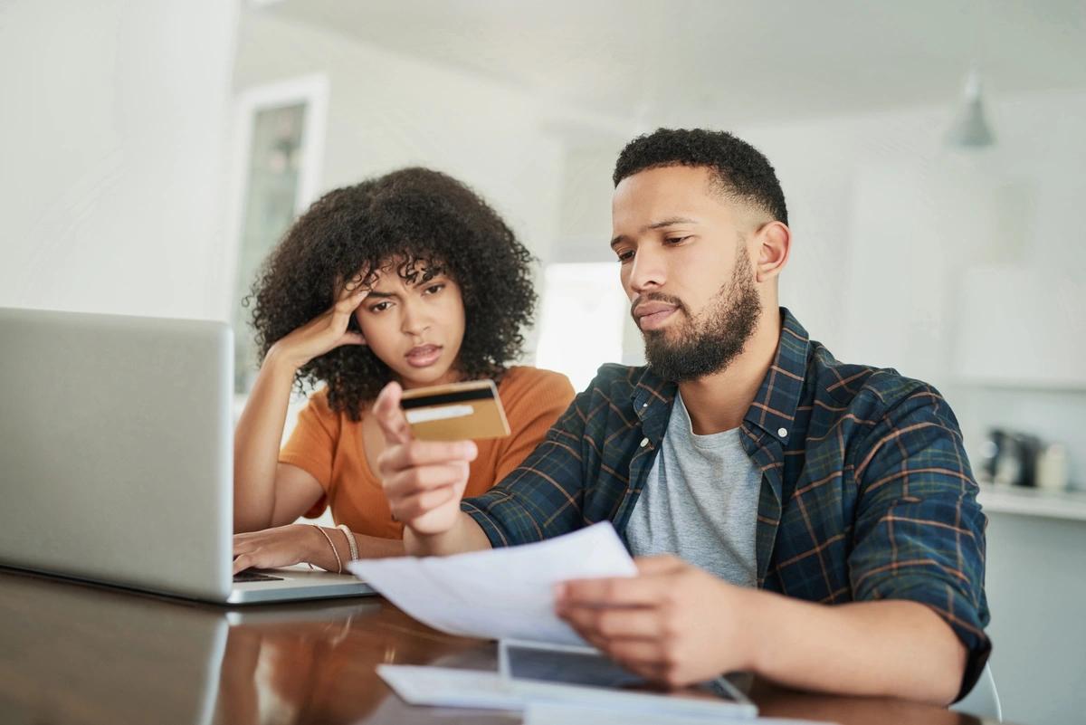 concerned couple with debt