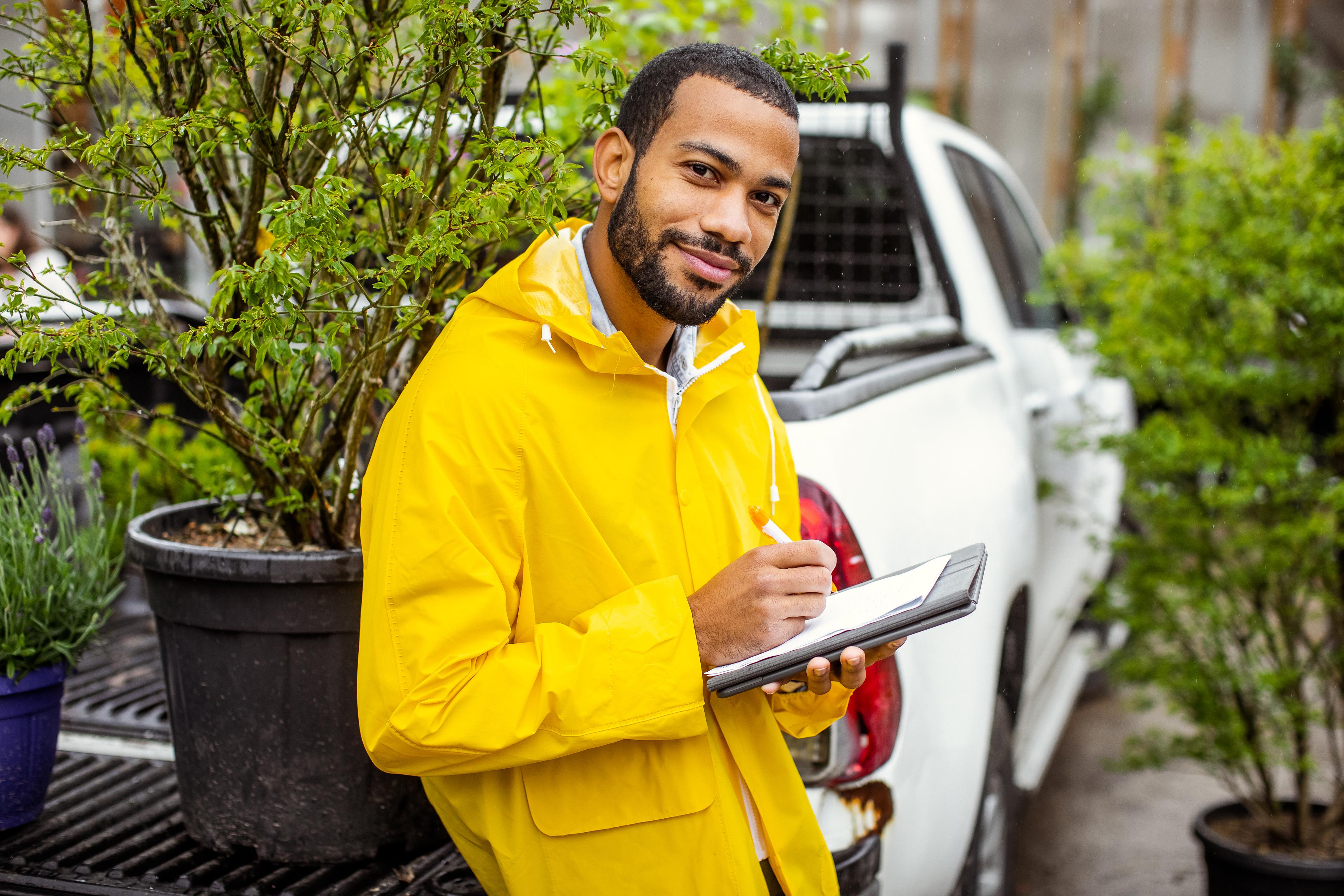 business owner in yellow jacket