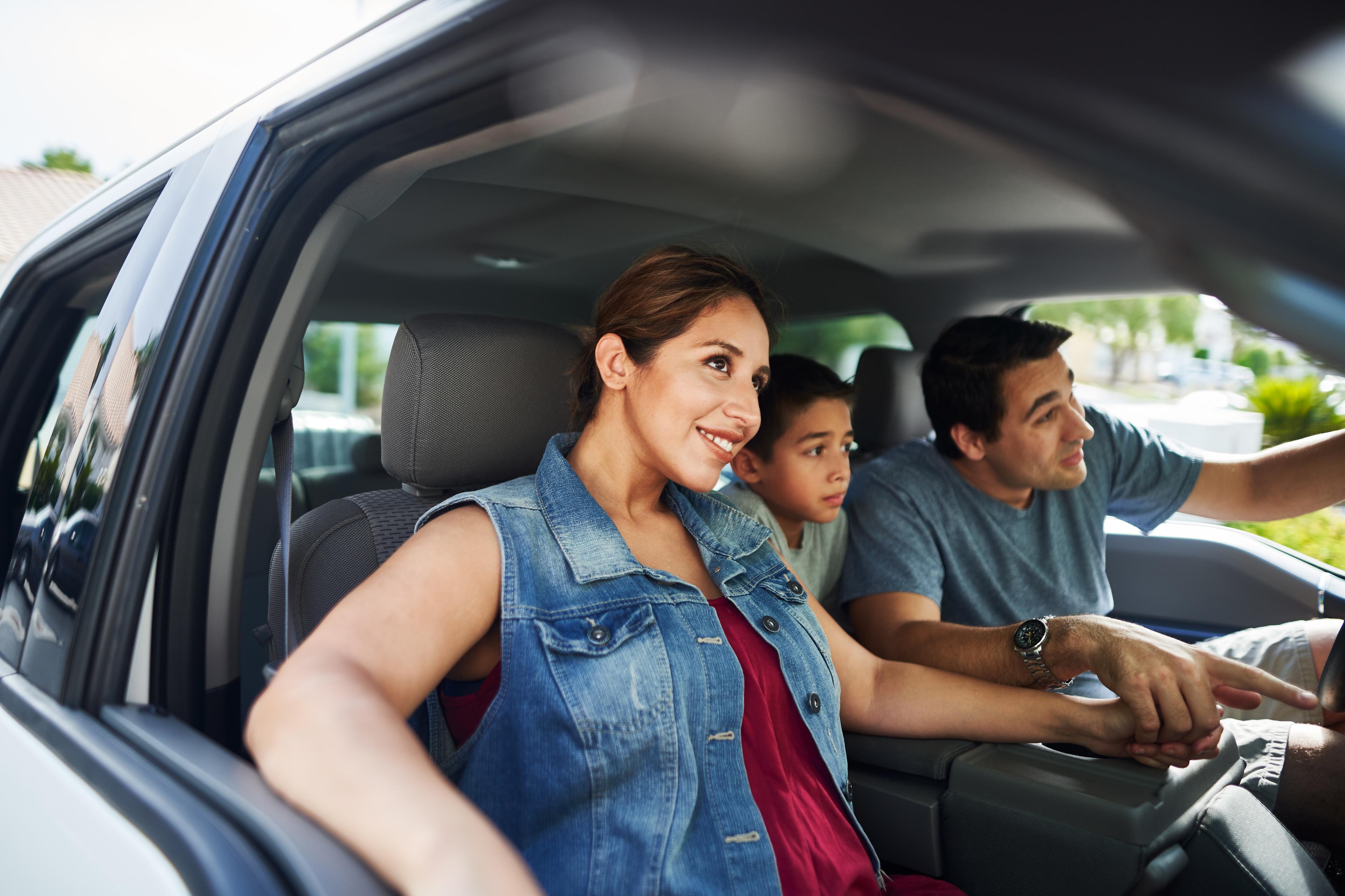 family riding in car